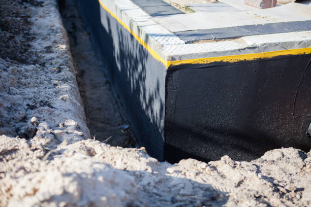 Professional Emergency Waterproofing technician working in Little River, KS